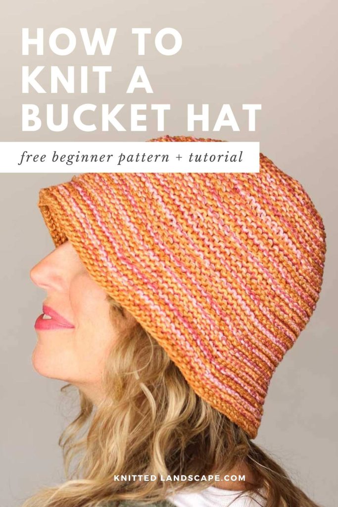 A woman wearing an orange knitted bucket hat.